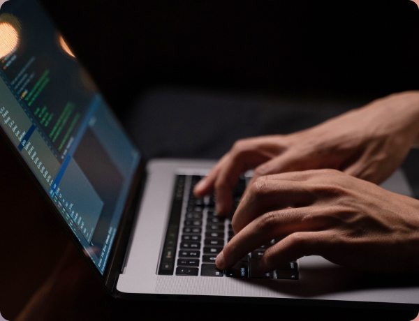 A developer working on a laptop