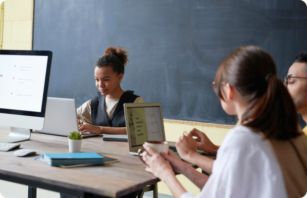 Teachers collaborating in a digital classroom